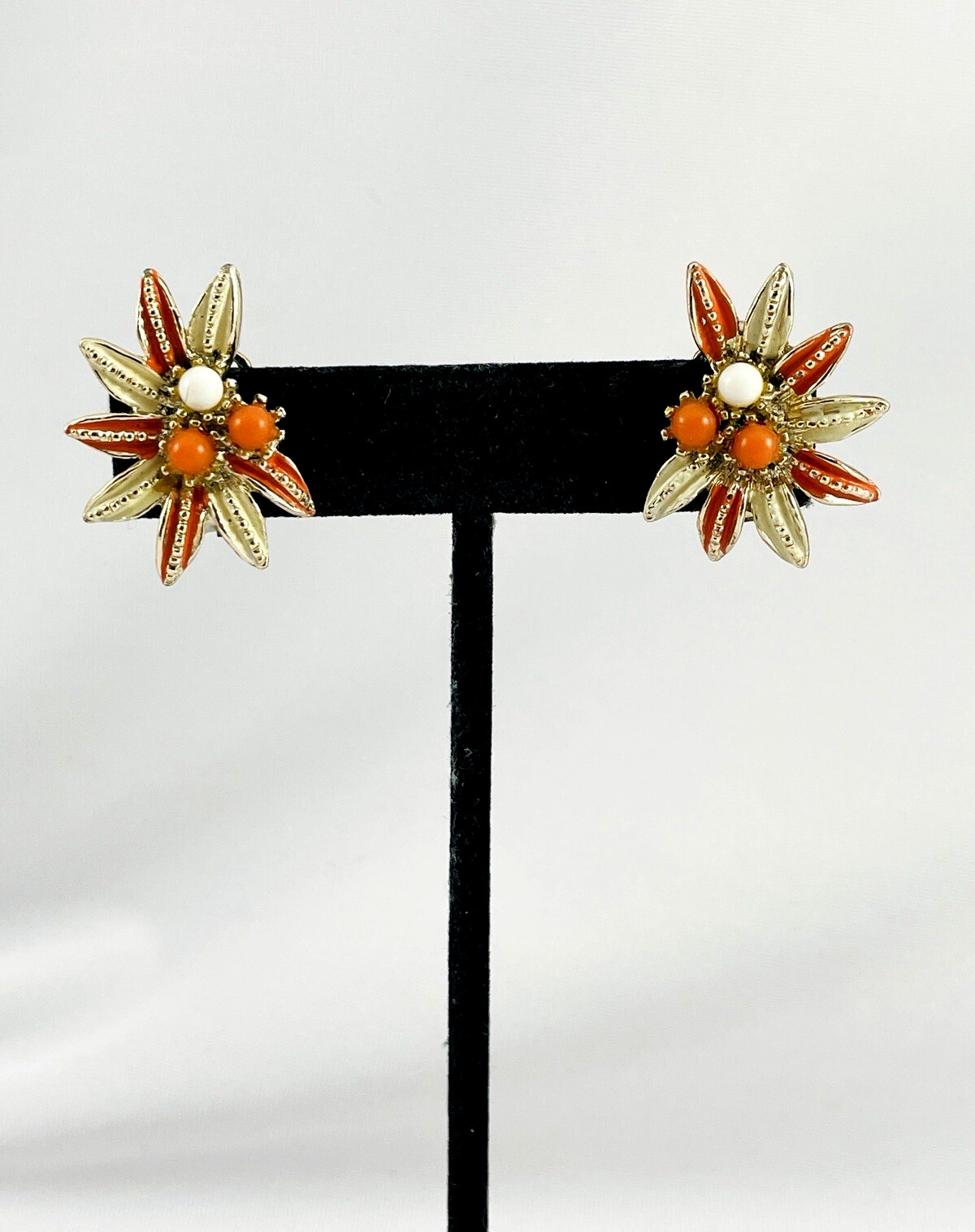 Vtg PAKULA Earrings Orange Cream Floral Burst Enamel Gold Tone Clip