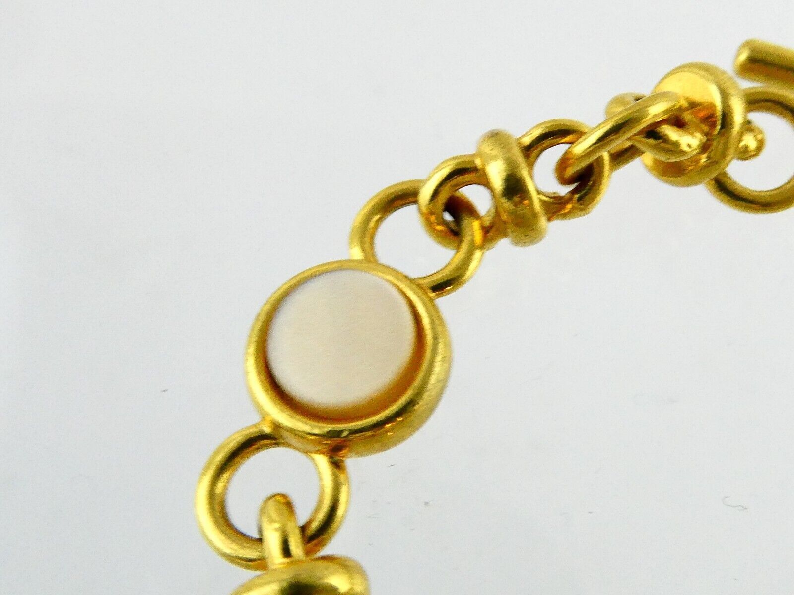Monet Goldtone Metal and Mother of Pearl Shell Link Bracelet Toggle Clasp 7 Inch