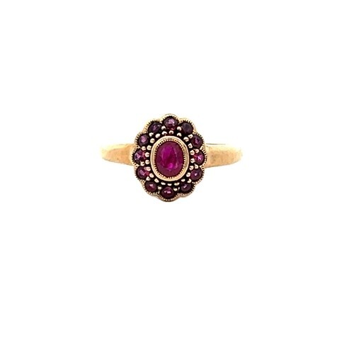 Vintage Red Oval Ruby 6×4 Halo design 1.20tcw ring 9 karat yellow gold sz 6.5