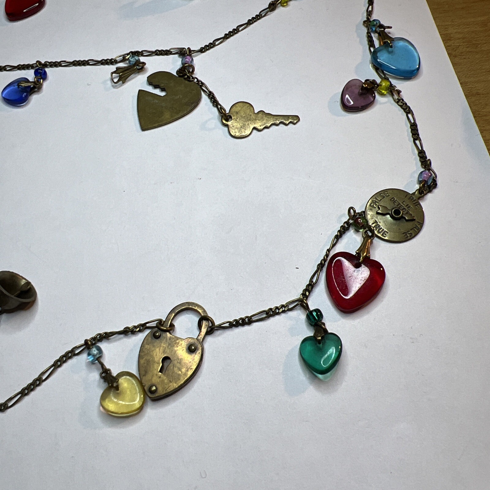 Vintage Glass Works Studio Necklace Unsigned Hearts Brass Charms Cherub