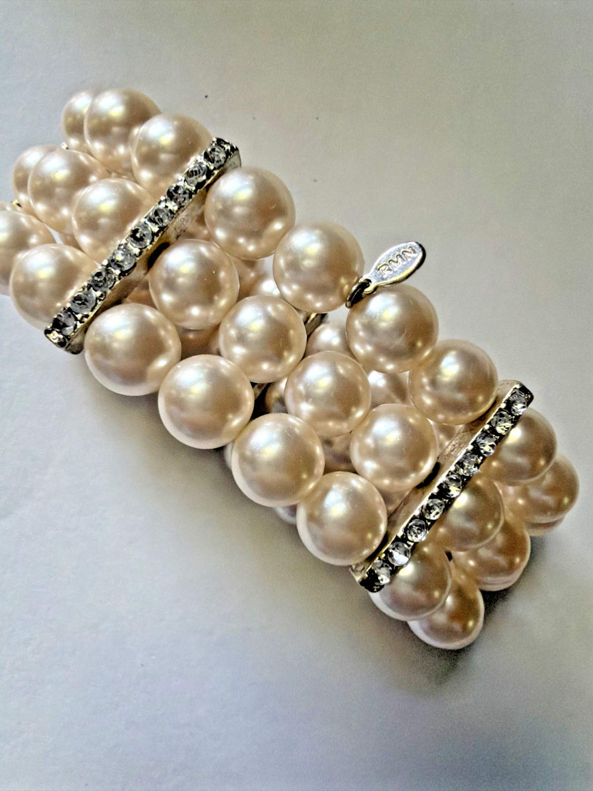 3 Strand Faux 1cm Pearl Rhinestone Stretch Bracelet RMN Signed Roman 1.25 in