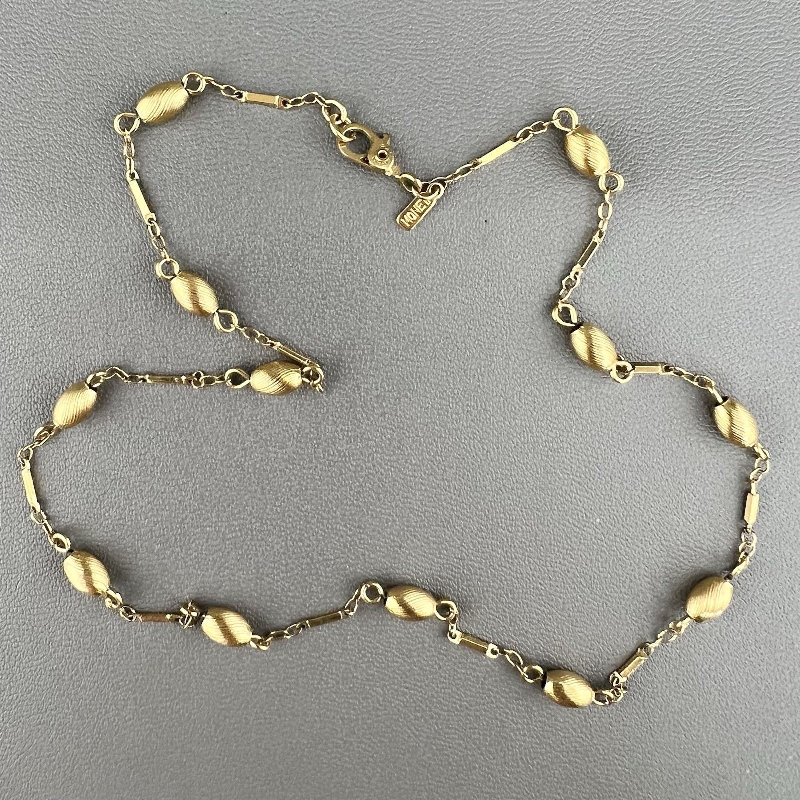 Vintage Monet Necklace Dainty Gold Tone Textured Oval Beads Bar Link Signed 15”