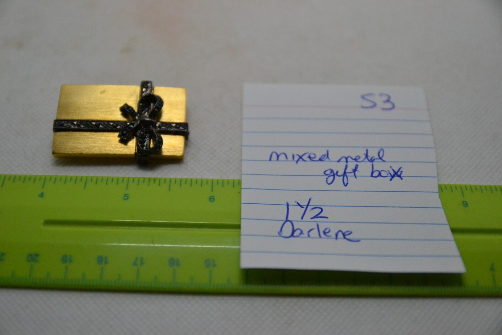 Two tone brooch, package w/ ribbon & bow, marked Darlene, 1.5 in. S3