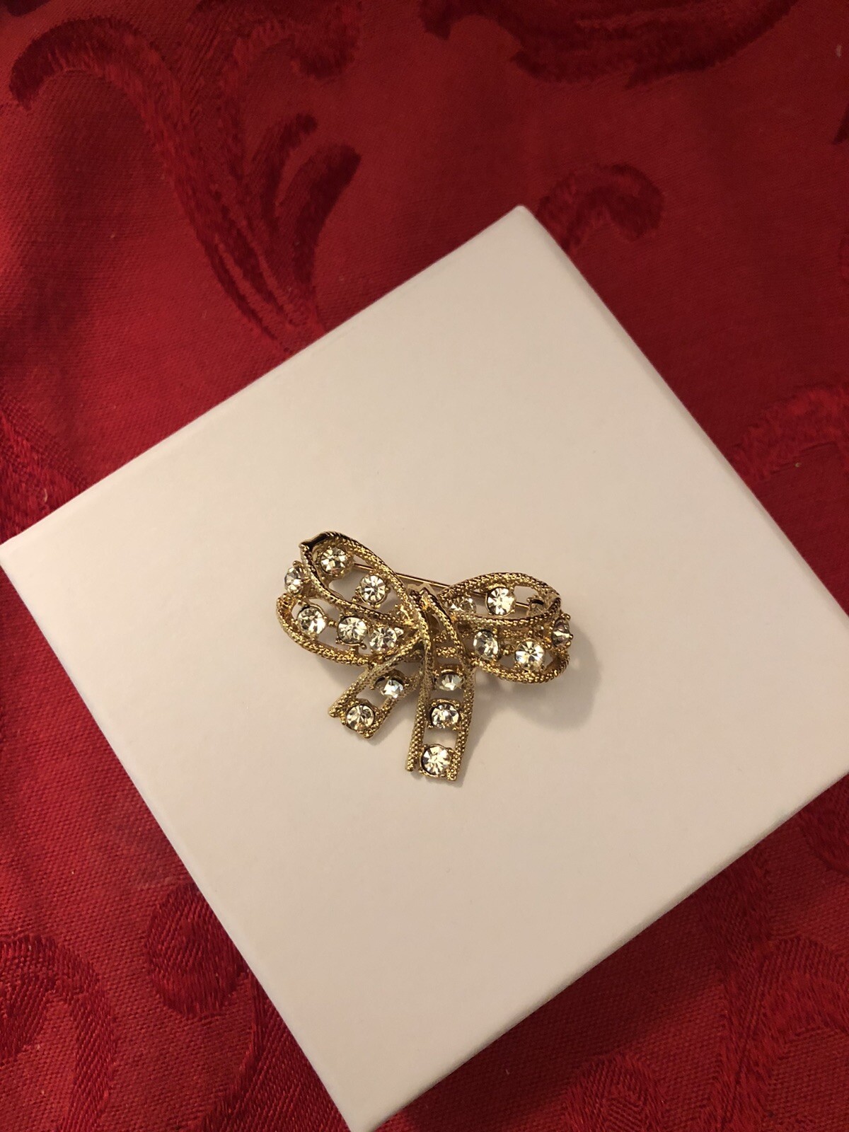 Kenneth Jay Lane KJL Signed Vintage Gold Tone Ribbon Brooch with Rhinestones