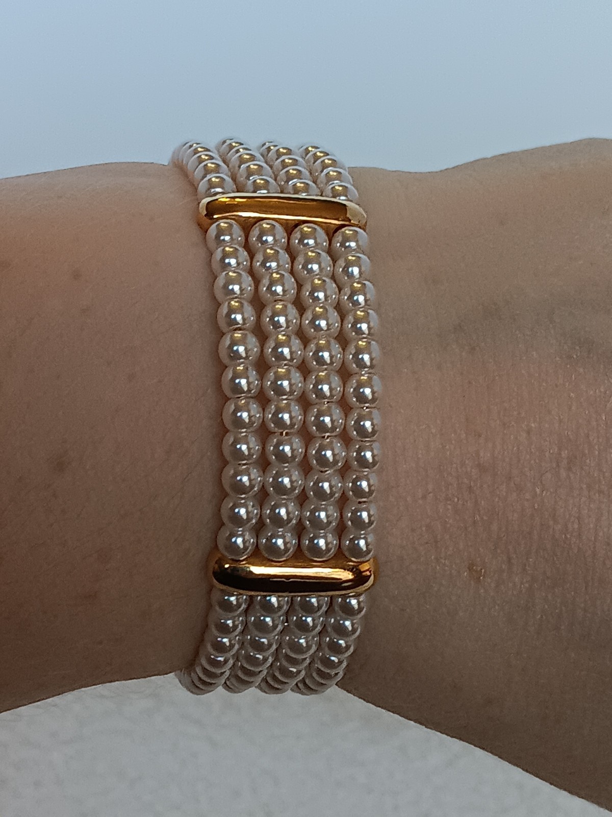 Vintage 4 Strand Faux Pearl Goldtone Tension Cuff Bracelet 7.5 in