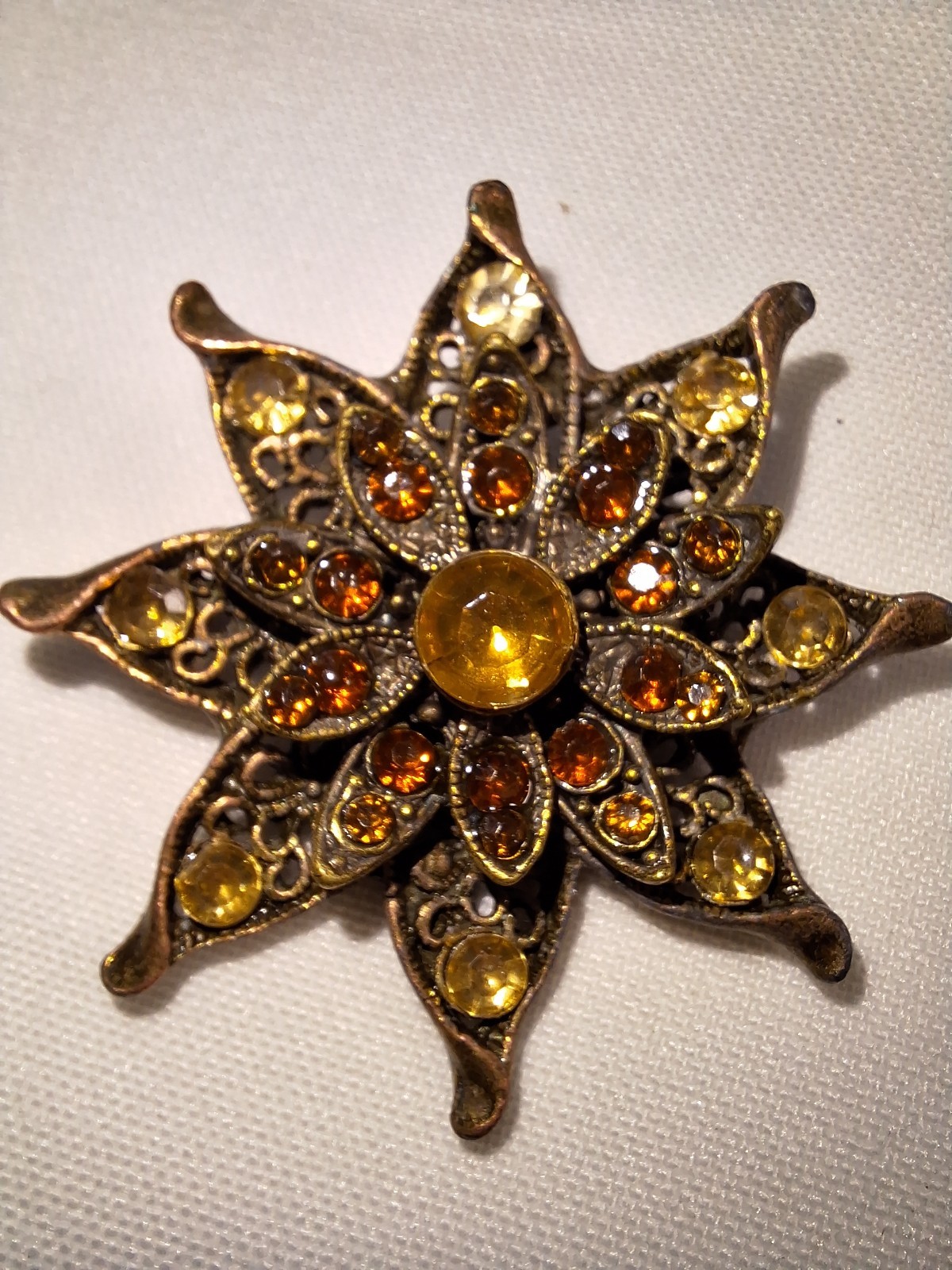 Brass Tone 8 Pointed Star Brooch With Topaz & Amber Stones