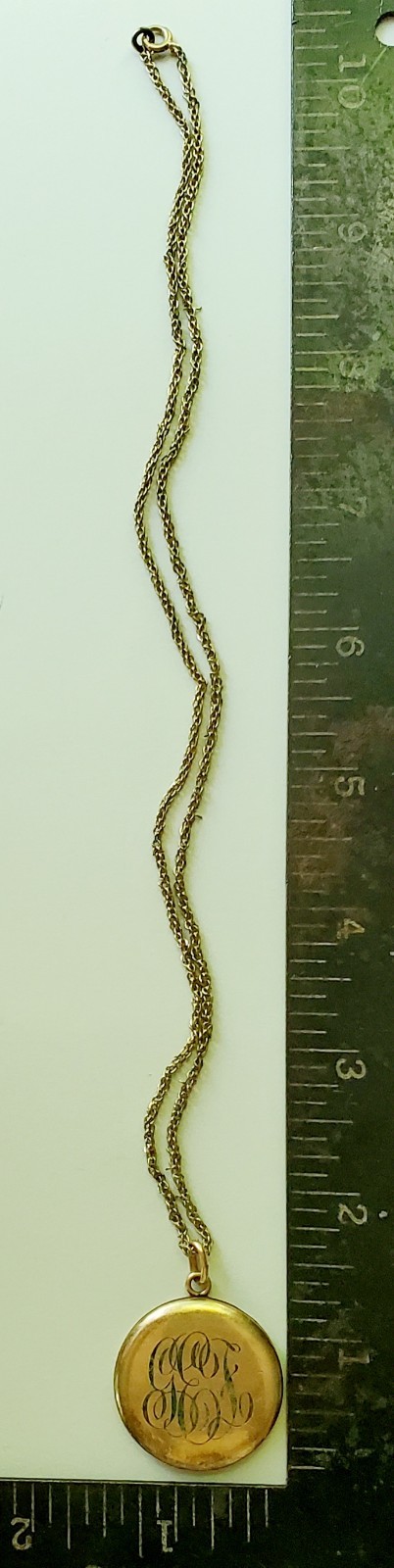 Antique gold tone etched/monogrammed locket pendant necklace stamped F.L.S.