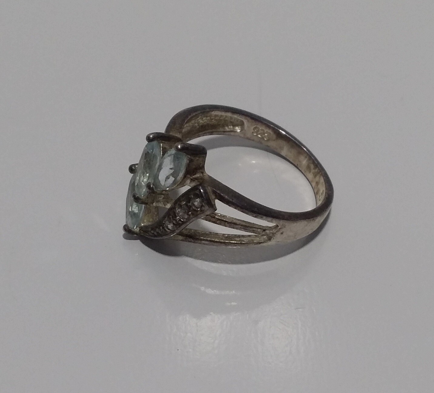 925 NV Sterling Silver Light Blue Topaz & Clear CZ Ring – Size 5
