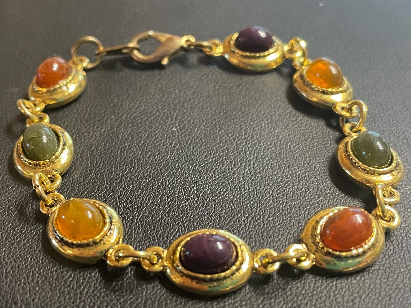 Vintage Bracelet 7.25” Naga Eye Gem Multi-Colored Gemstone amulet gold tone