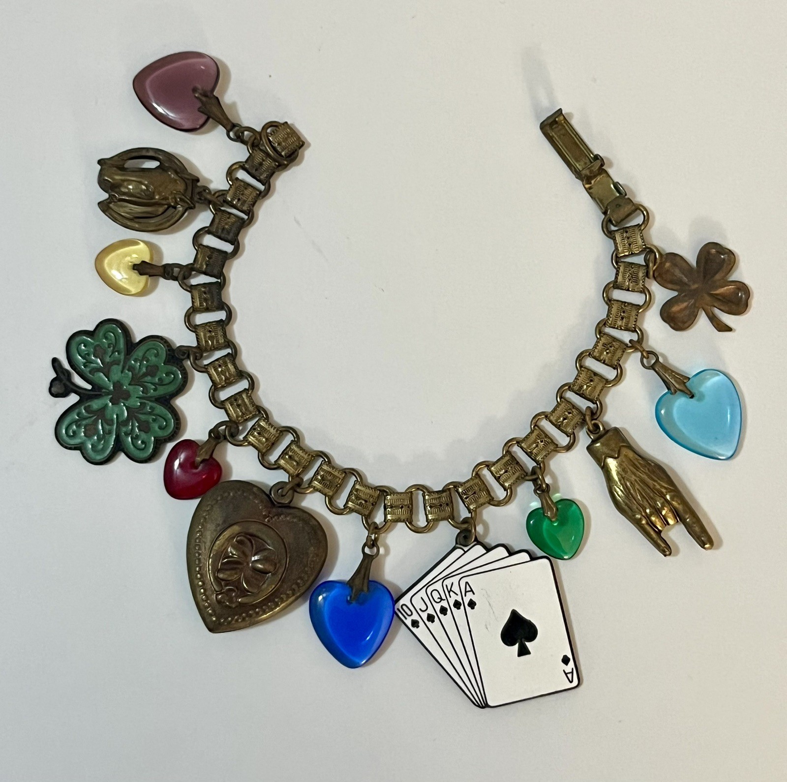 Vintage Charm Bracelet Poker Shamrock Dangles Cards Hearts Glass Works Studio ?