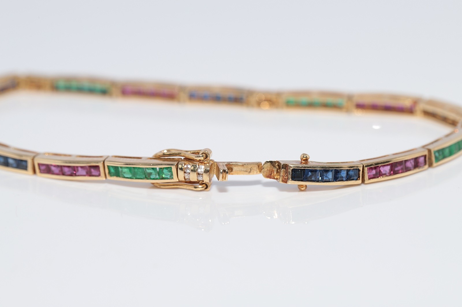 Vintage Circa 1980s 18k Gold Natural Diamond And Emerald Ruby Sapphire Bracelet
