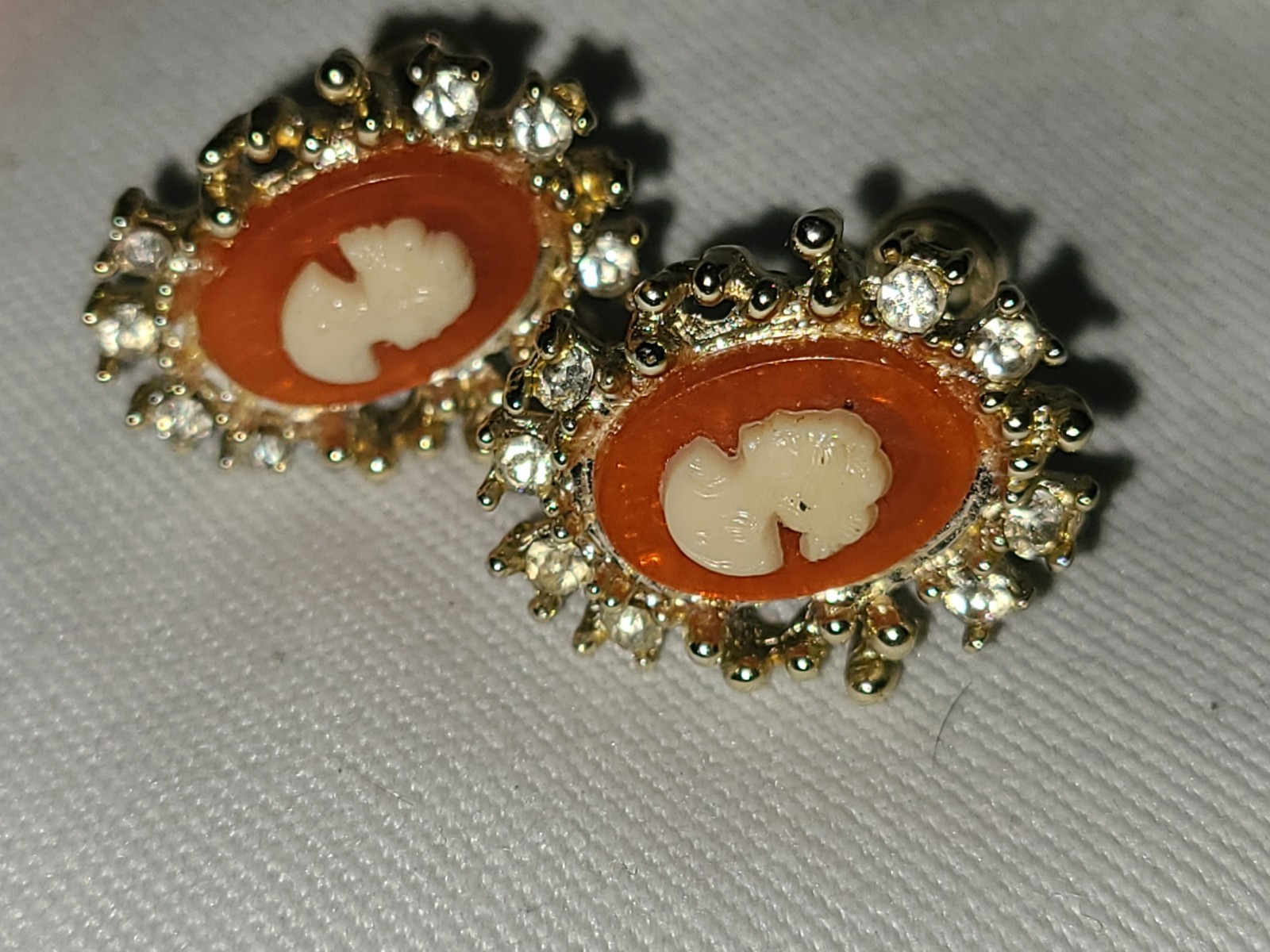 Vintage Coral Color Lucite Cameo Screw Back Earrings Rhinestones Gold tone