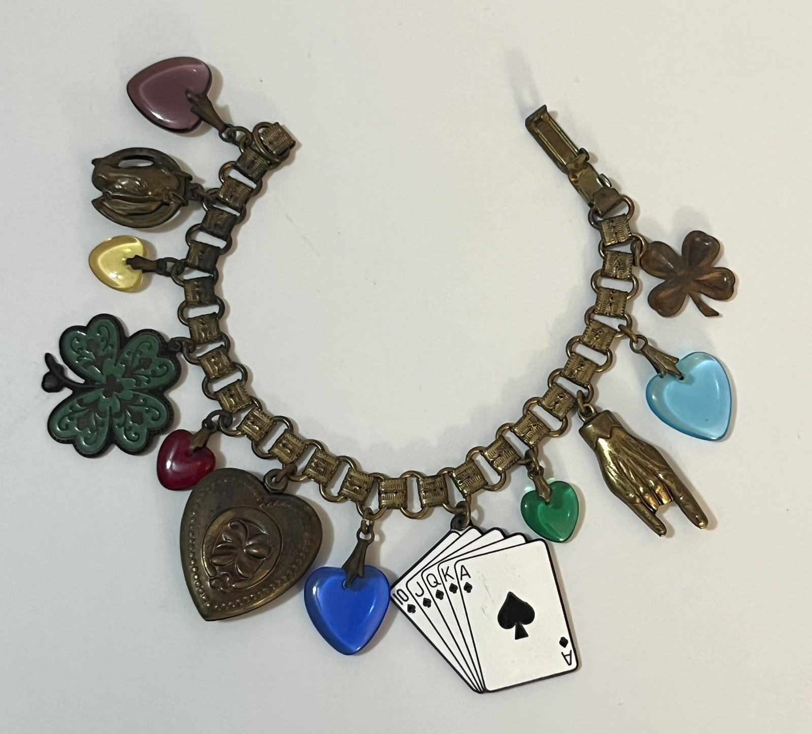 Vintage Charm Bracelet Poker Shamrock Dangles Cards Hearts Glass Works Studio ?