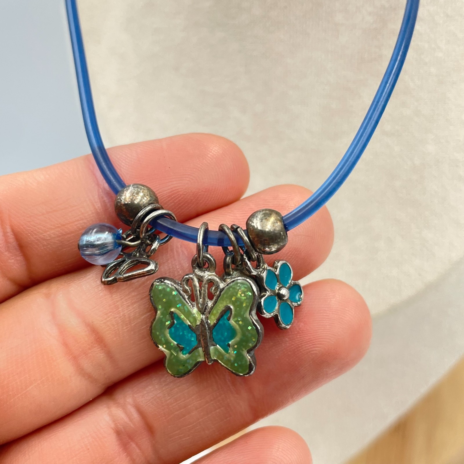 Vintage Y2K Blue Rubber Cord Necklace Butterfly Flower Charms Enamel Goth Grunge