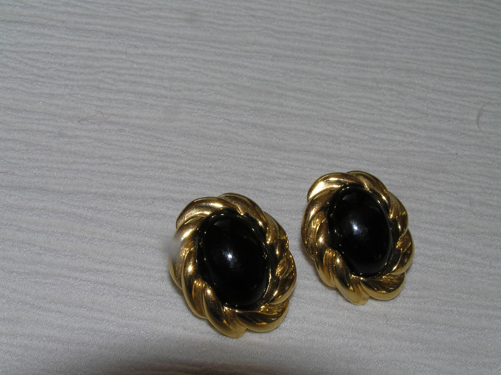 Estate KJL Signed Twist Oval Goldtone with Magnetic Black Plastic Cab Post Ear