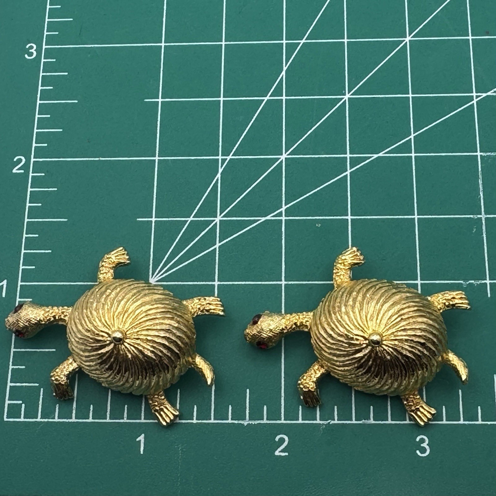 Goldtone Textured Twin Turtle Brooches Red Rhinestone Eyes
