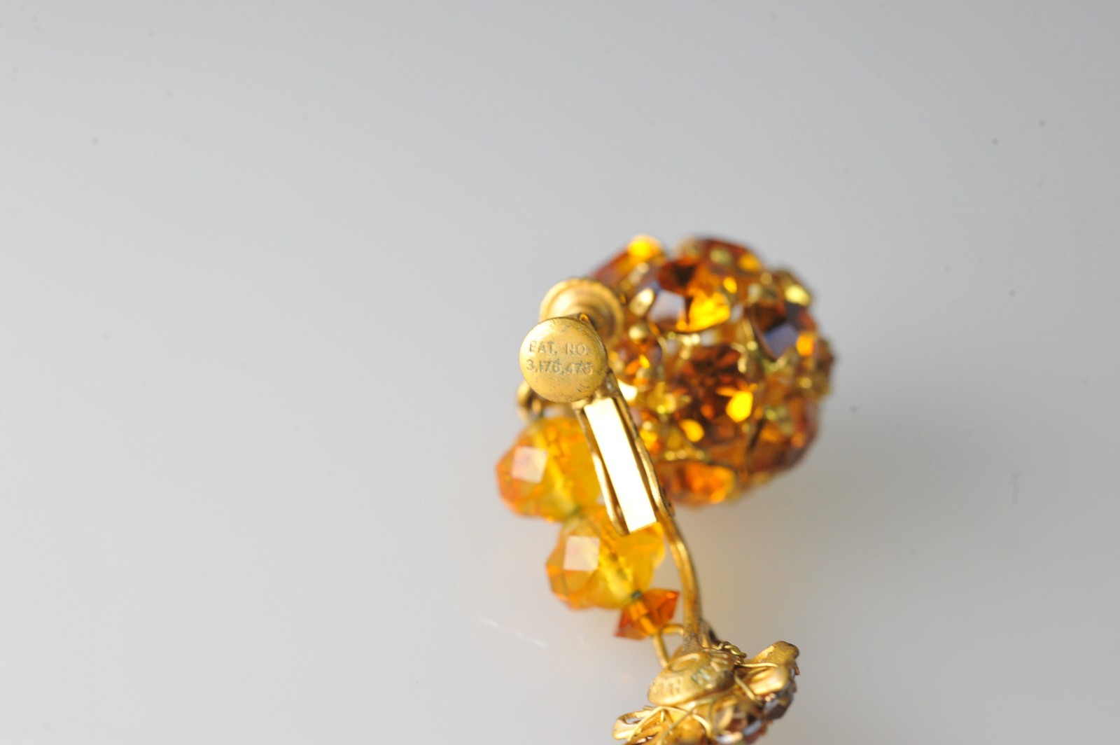 Vtg signed Miriam Haskell rhinestone Gold Tone drop clip earrings amber color