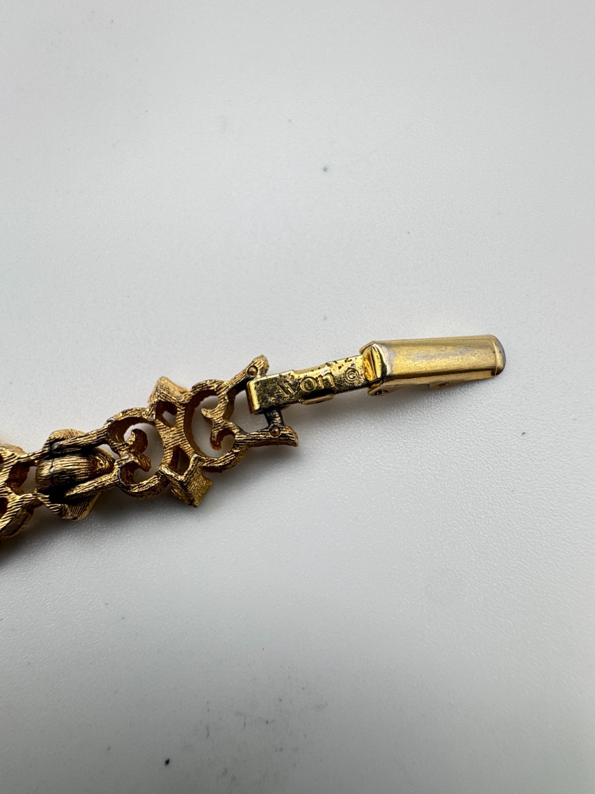 Vintage Avon Bracelet Precious Pretenders Gold Tone Scroll Link 1971