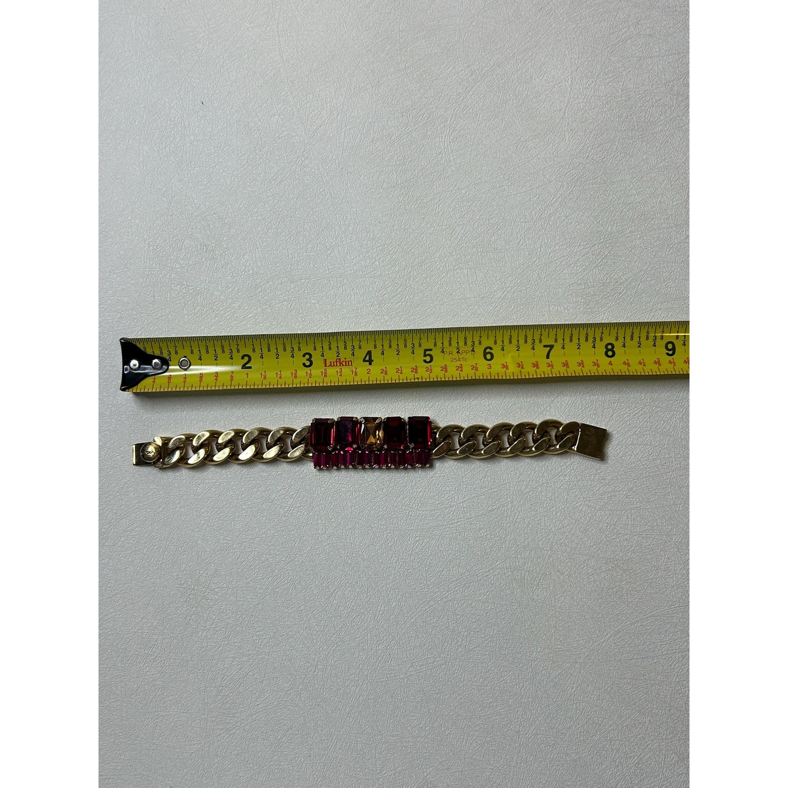 Coach Gold-Tone Curb Chain Bracelet with Fuchsia and Red Rhinestones
