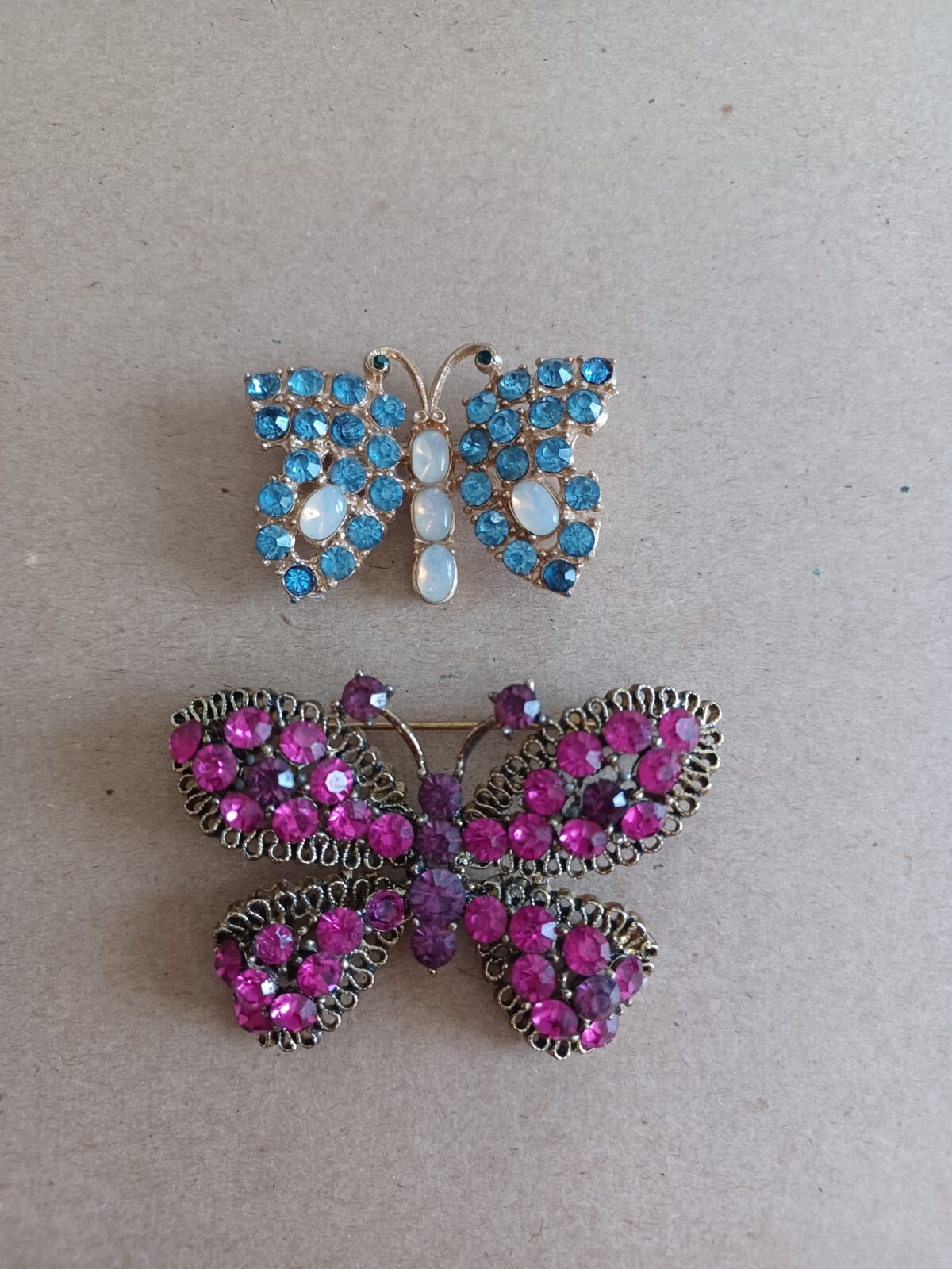 Vintage Lot Of 2 Rhinestone Butterfly Pins Brooches Pink Purple And Blue Milky
