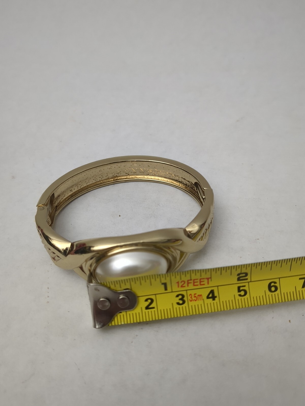 Large Faux Pearl Gold Tone Bracelet 8 1/2″ around, 1 1/4″ wide, 2 1/4″ across