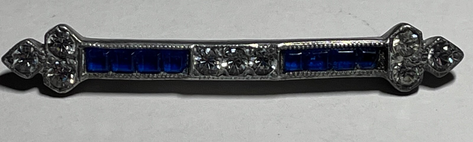 ANTIQUE SILVERITE HWF & SON BAR PIN WITH CLEAR RHINESTONES & SAPPHIRE BLUE GLASS