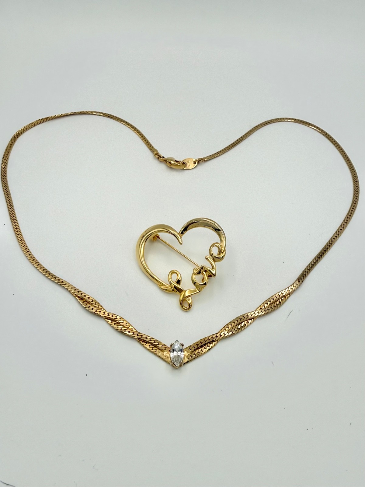 NR signed Goldtone vintage Avon necklace and unbranded brooch