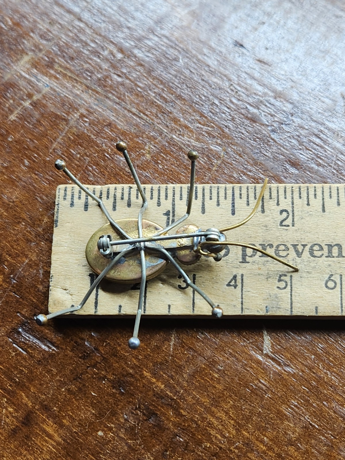 Wonderful Antique Bug Pin With Blue Glass Body And Tiny Purple and Red Head/Eyes