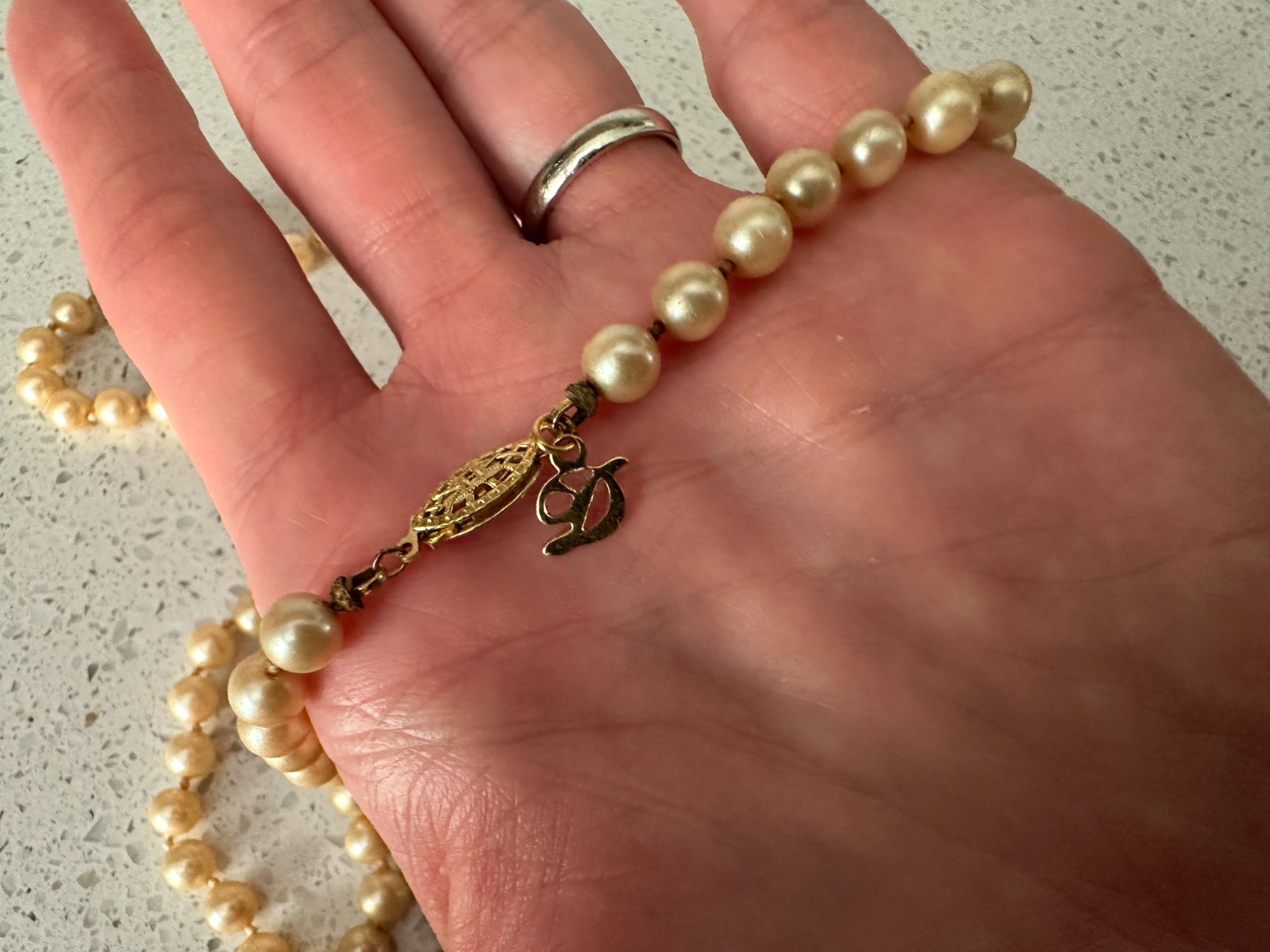 30 Inch Strand of Vintage Cream Colored Faux Pearls with fish hook clasp D logo