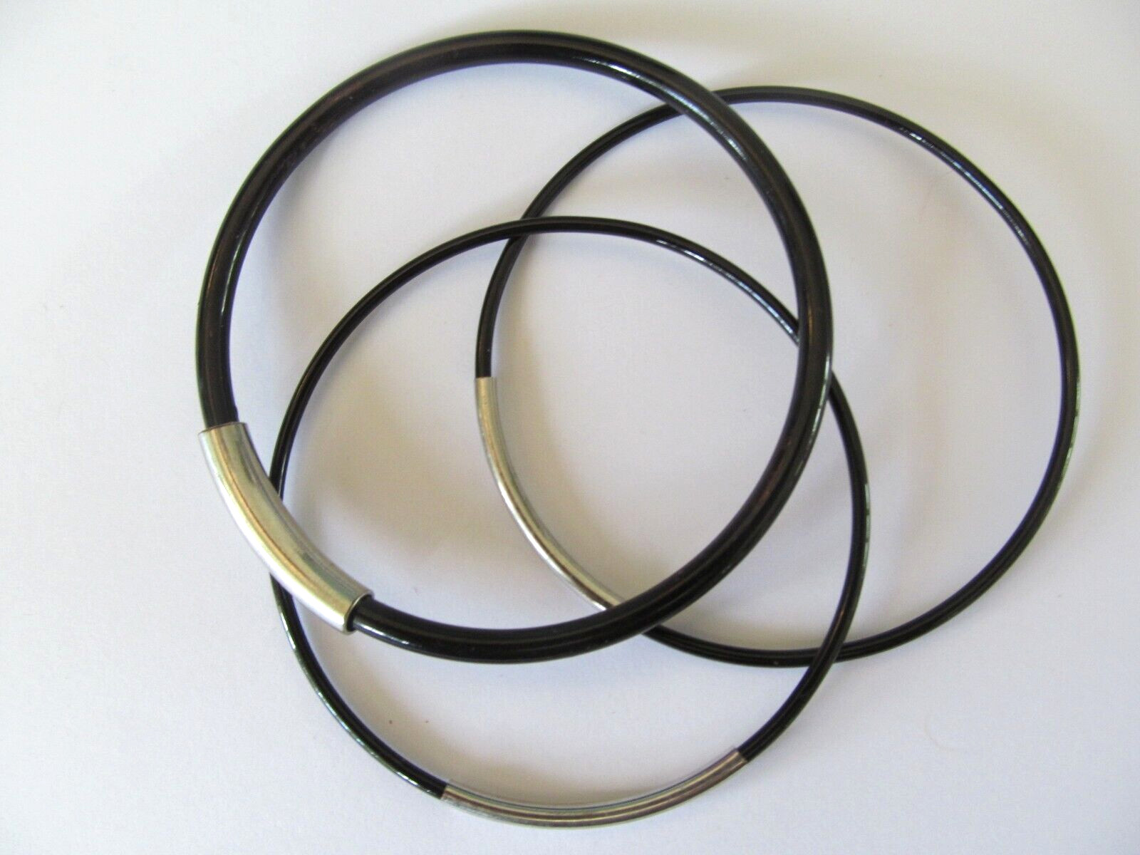 THREE DIFFERENT SHAPES BLACK METAL w/SILVER BAND DESIGNS SLIP ON BANGLE BRACELET