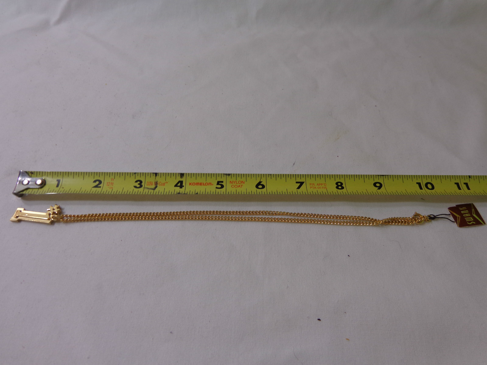 VINTAGE GOLD TONE NECKLACE SWANK 1970’S 1980’S NOS #1 PENDANT ONE FIRST PLACE