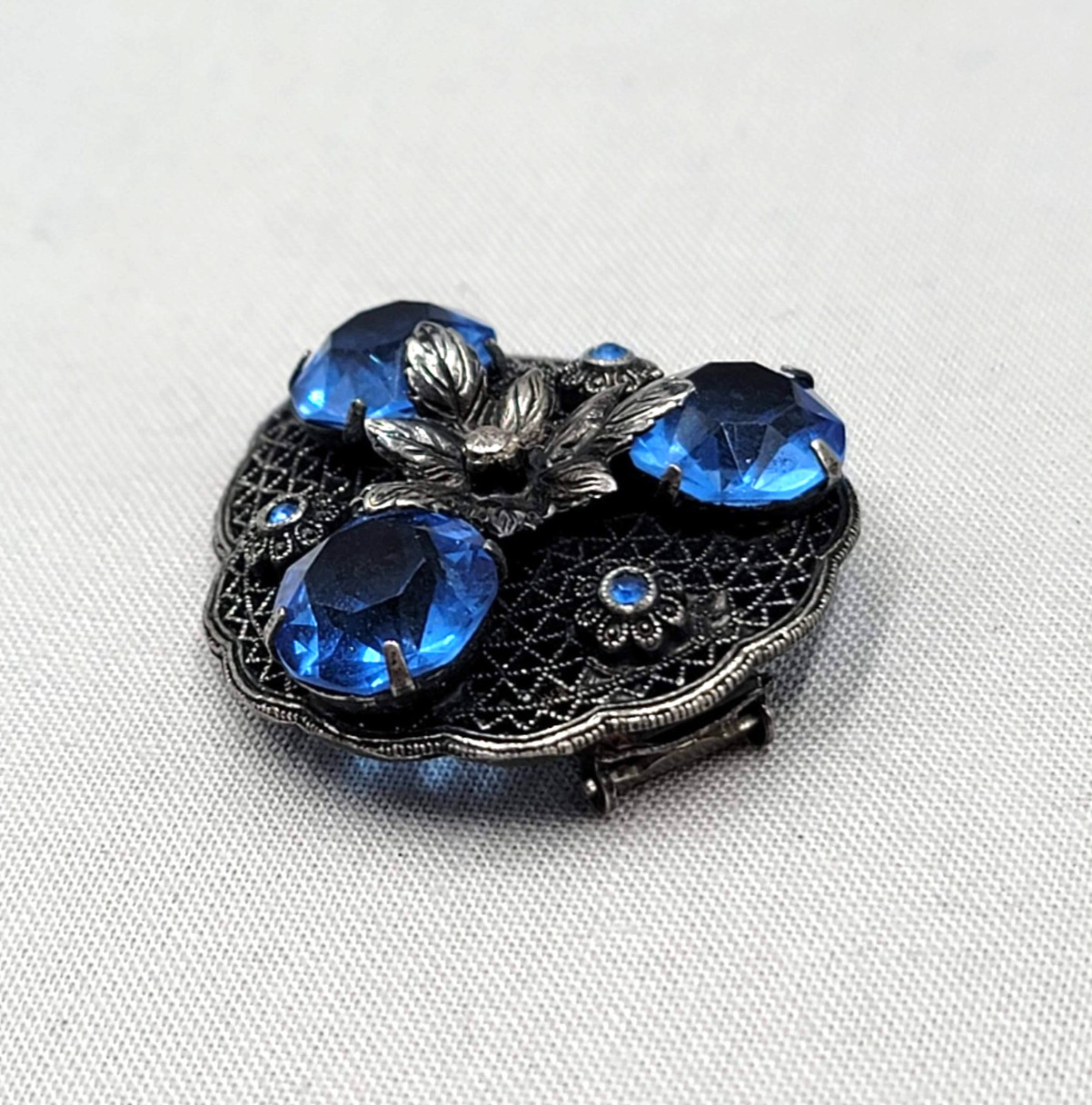 Vintage Bright Blue Rhinestone Dress Clip Embossed Oxidized Silver tone 1.5″