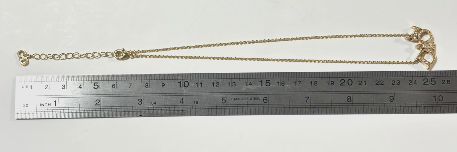 Christian Dior necklace pendant Features the DIOR logo rhinestones gold plating