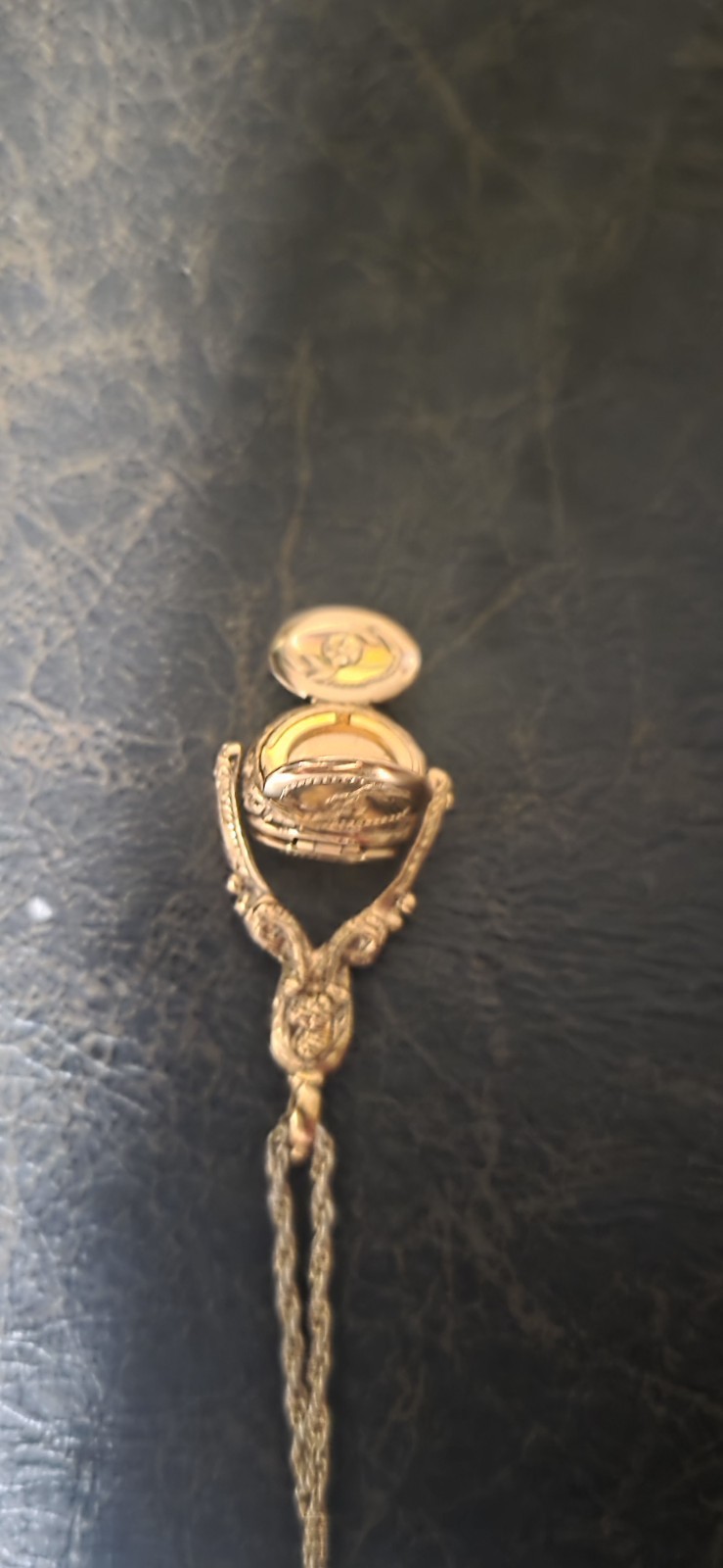 gold-tone vintage-style locket 1928 Jewelry Company 3-sided rotating design