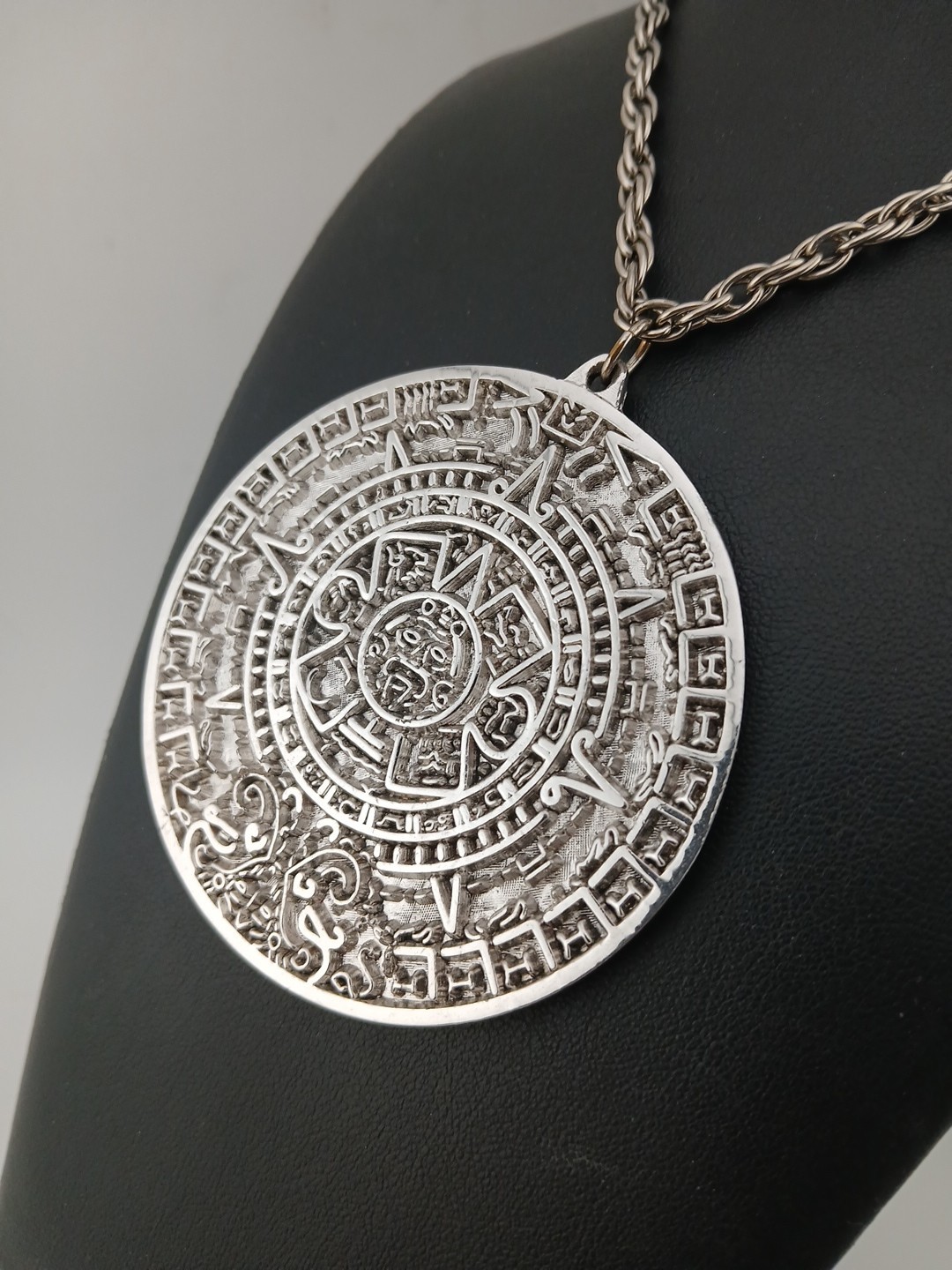 TORTOLINI 1960s silver tone Aztec Calendar textured design medallion necklace