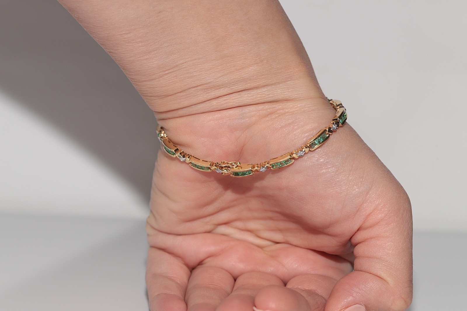 Vintage Circa 1980s 18k Gold Natural Diamond And Caliber Cut Emerald Bracelet