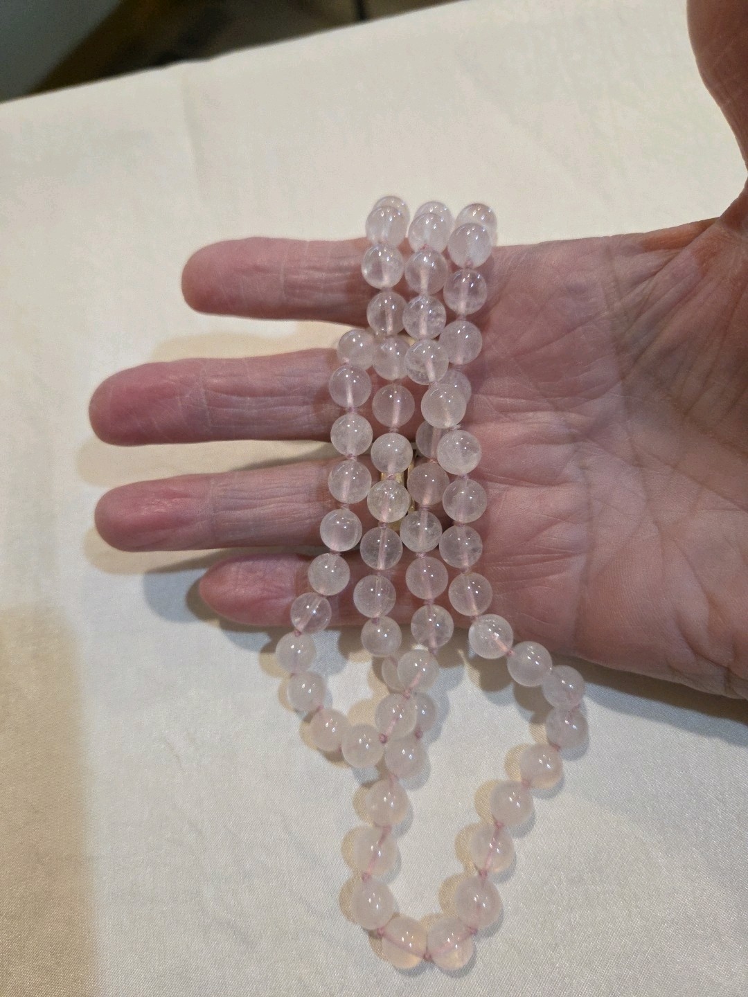Delicate Vintage rose quartz necklace, continuous strand 31 inches in length.