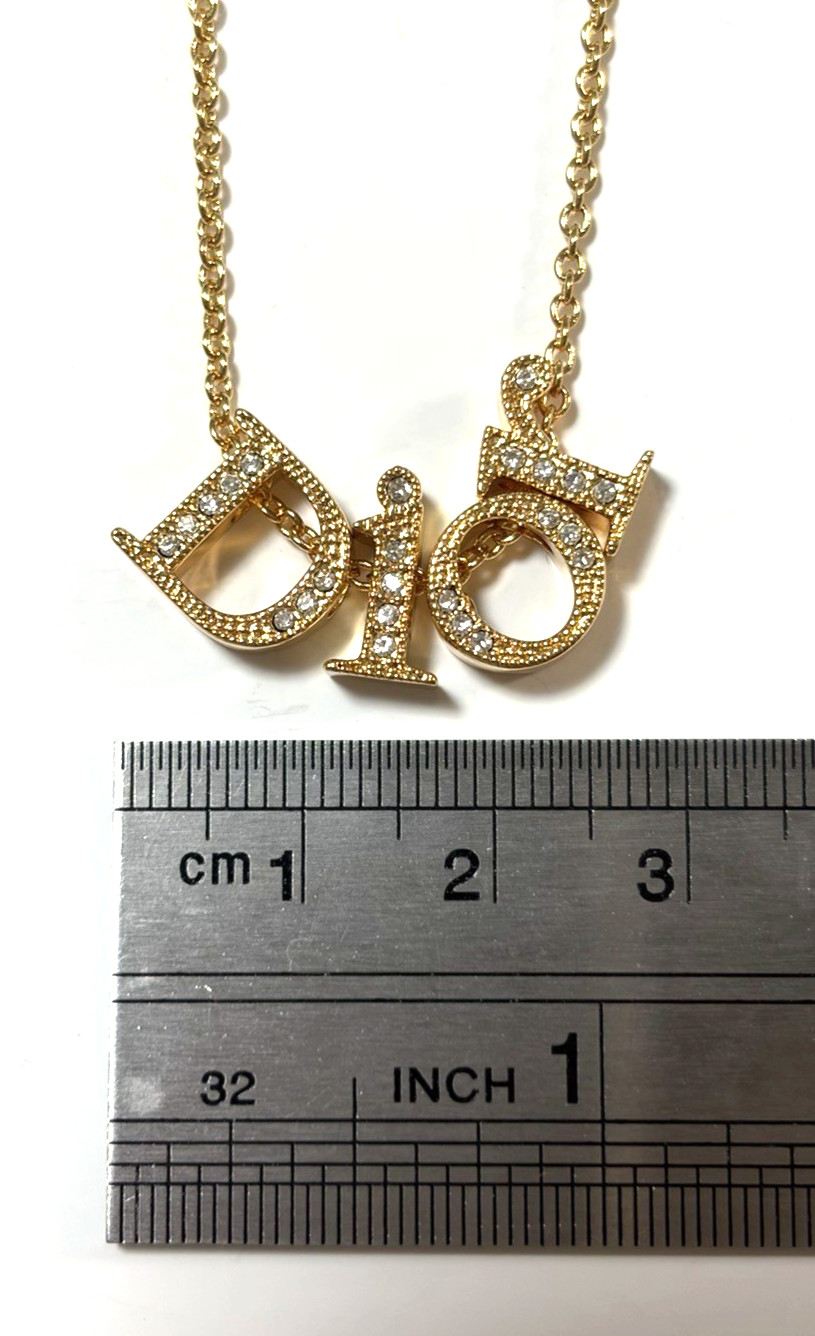 Christian Dior necklace pendant Features the DIOR logo rhinestones gold plating