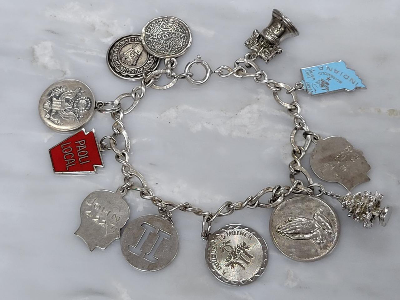 Vintage Sterling Silver Charm Bracelet w/ 12 Charms ~ 7-1/4″ ~ 42.7g ~ 5-E508