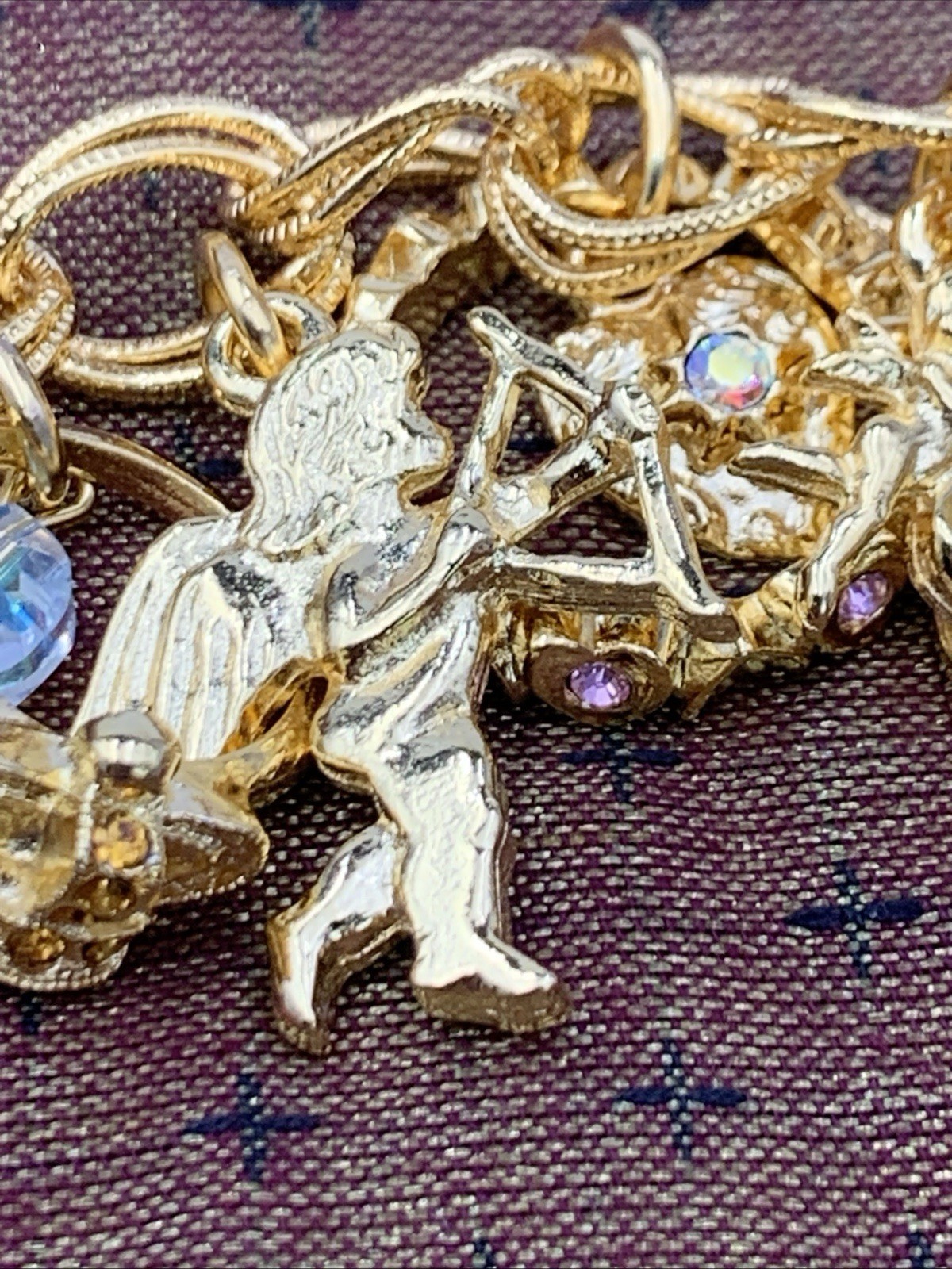 Kirks Folly Gold Tone Charm Bracelet Cupid Hearts Rings Crystals Angel