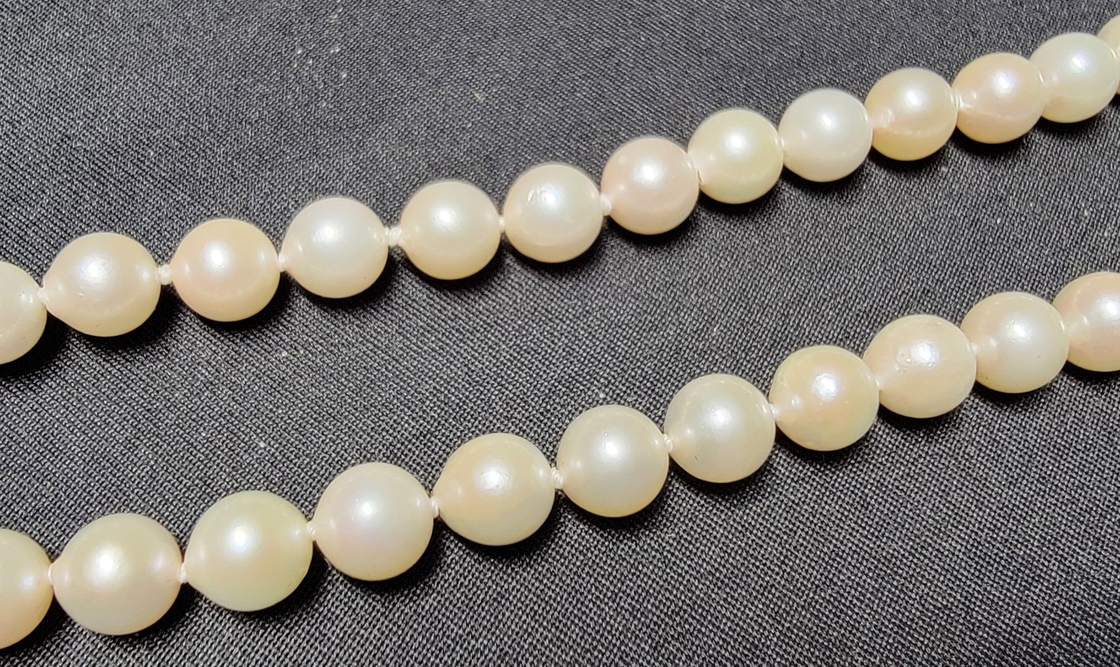 Vintage Pearl Necklace 6.9mm Pearls and 14K Gold Clasp 23.5 in Matinee Length