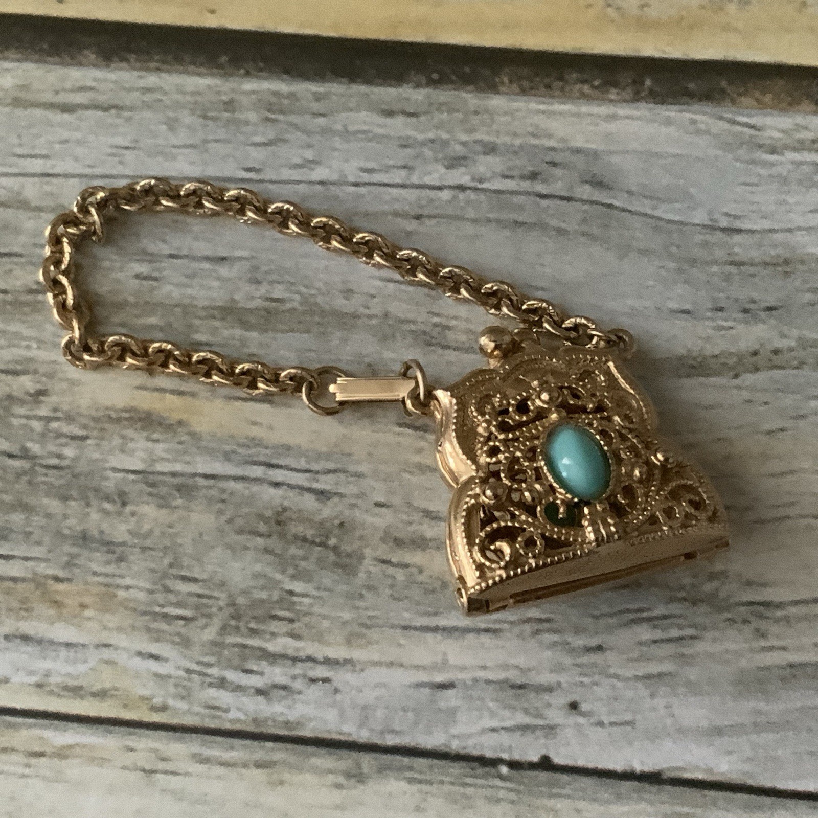 Vintage Small filigree Metal Purse charm with blue accent bracelet in gold tone