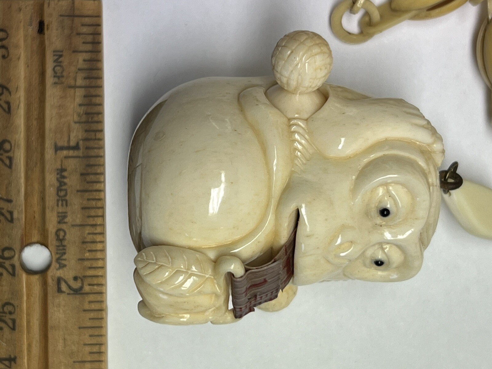ANTIQUE ART DECO MONKEY NECKLACE TAPE MEASURE CELLULOID CHAIN PENDANT WHIMSICAL