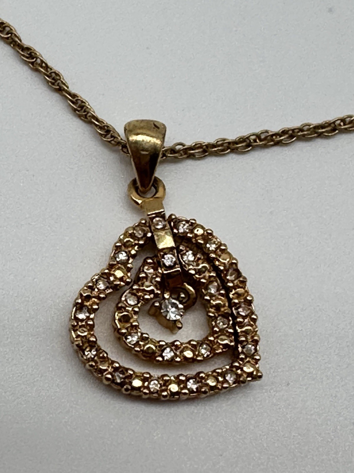 Avon Triple Heart Pendant Gold Tone And CZ Chain Necklace Graduated Open Hearts