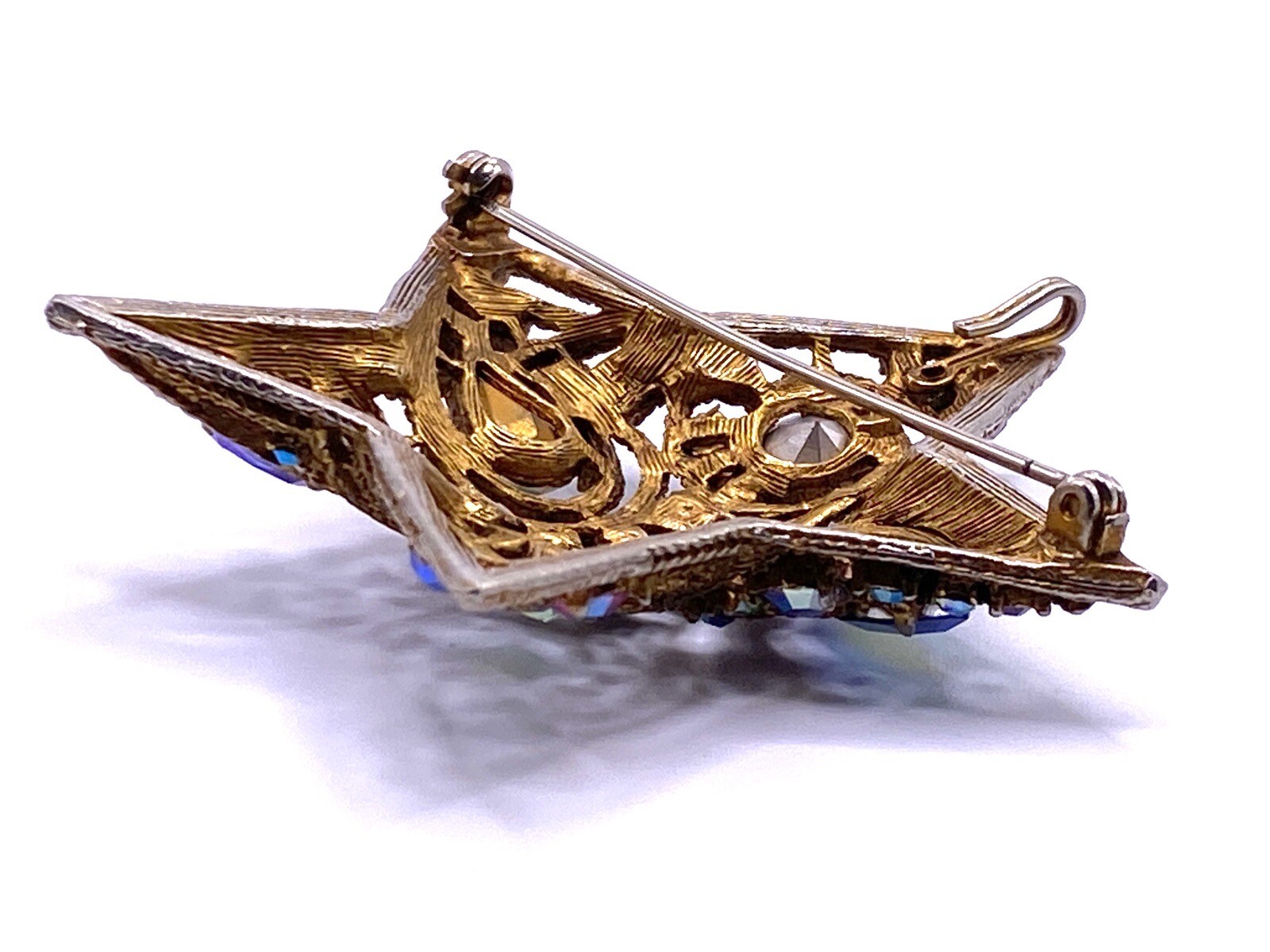 La Roco 1950s Star Brooch Colorful Gold Tone Rhinestones Textured Gold Plate