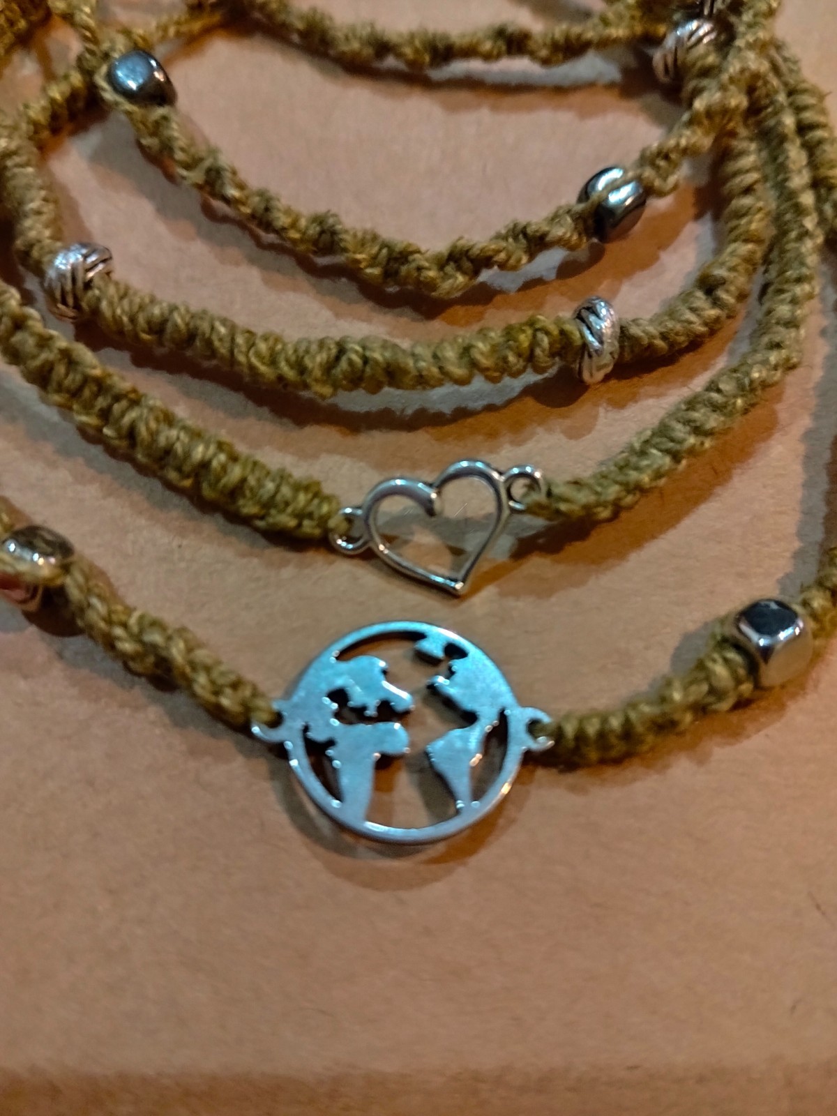 A piece Adj Hemp Bracelet with Natural Marigold & Rust Dye – Boho Style 2 beads