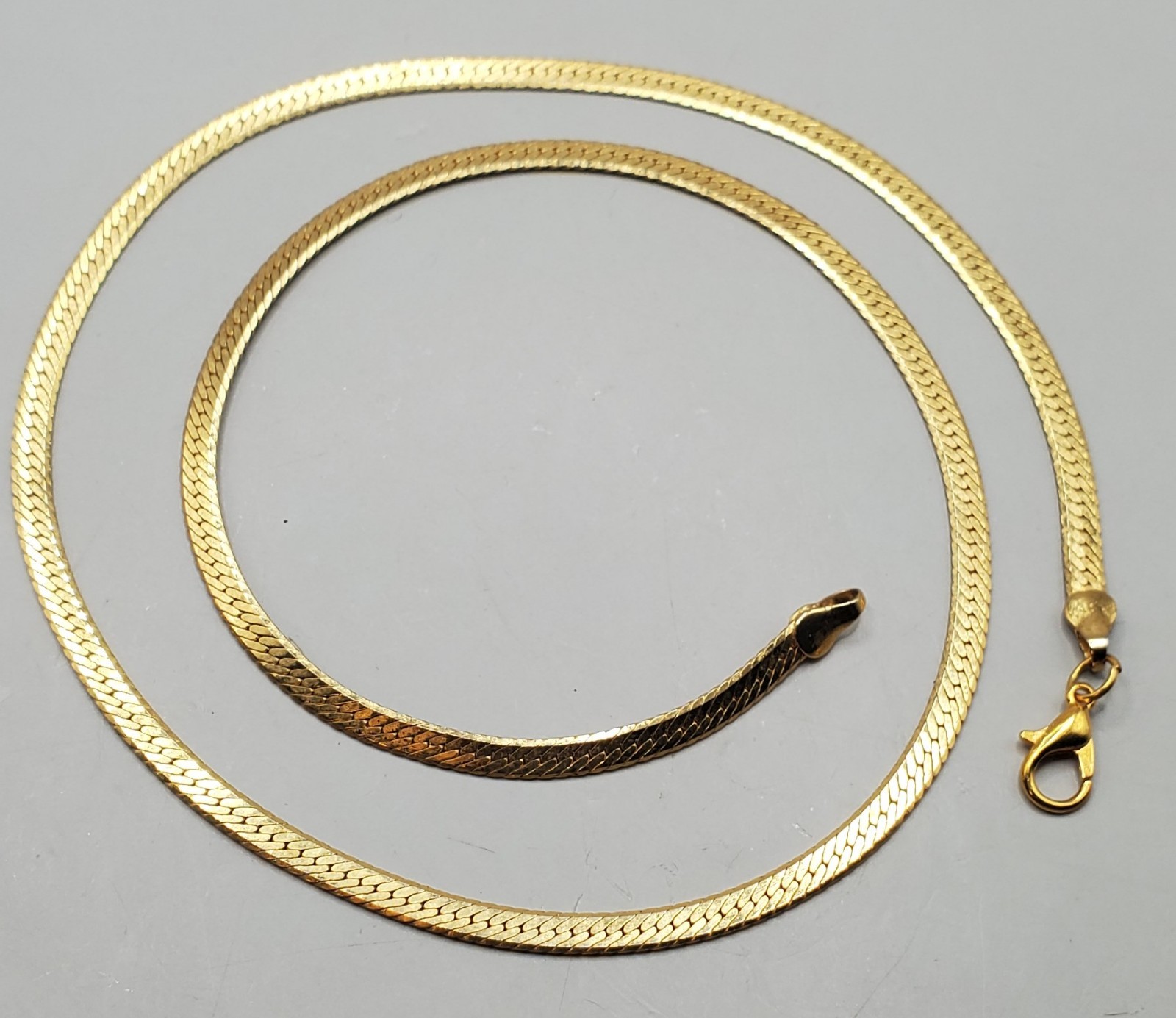 3 Vtg Chains: Trifari 24″, Herringbone 20″, Gold Tone & Black Twisted Rope 30″