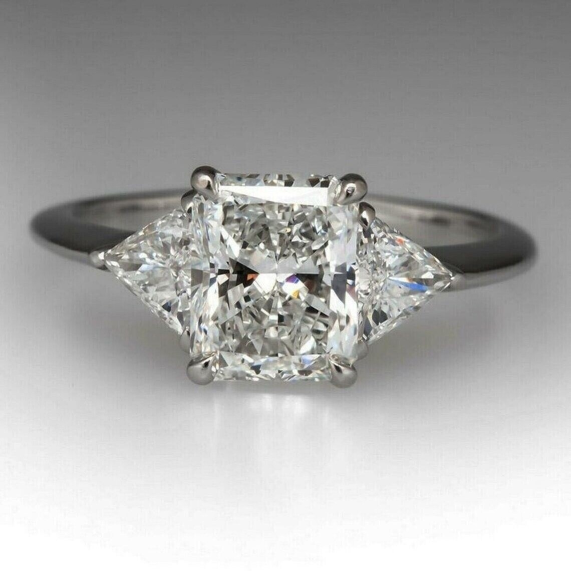 New Remarkable Radiant Cut Propose Ring in Silver Three-stone Engagement Ring