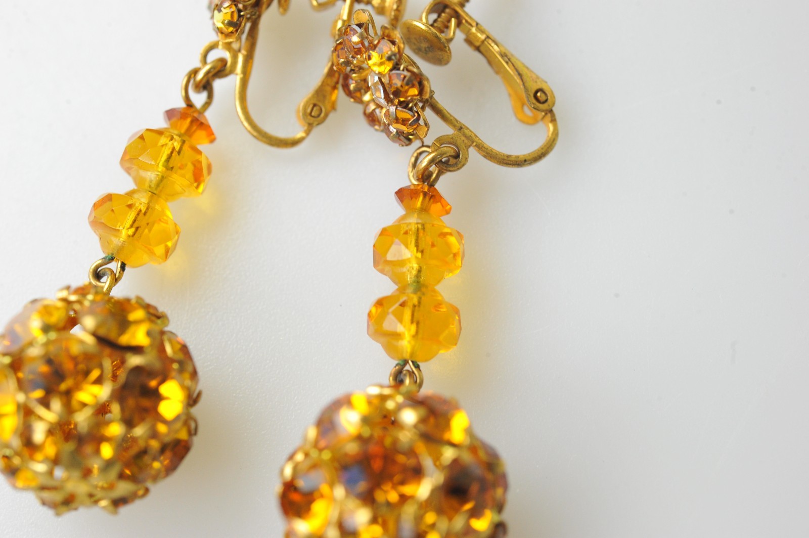 Vtg signed Miriam Haskell rhinestone Gold Tone drop clip earrings amber color