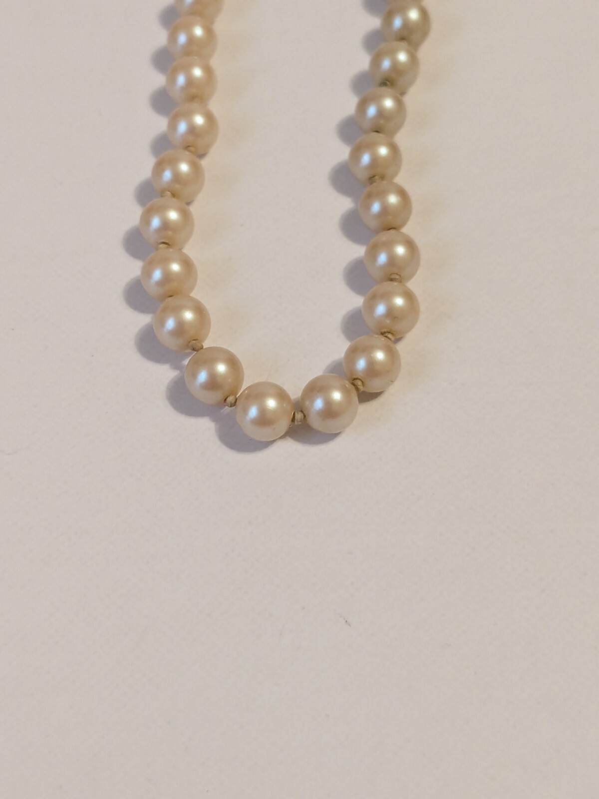 Faux Pearl Vintage Hand Knotted Necklace. Champagne. Barrel Closure 15″.